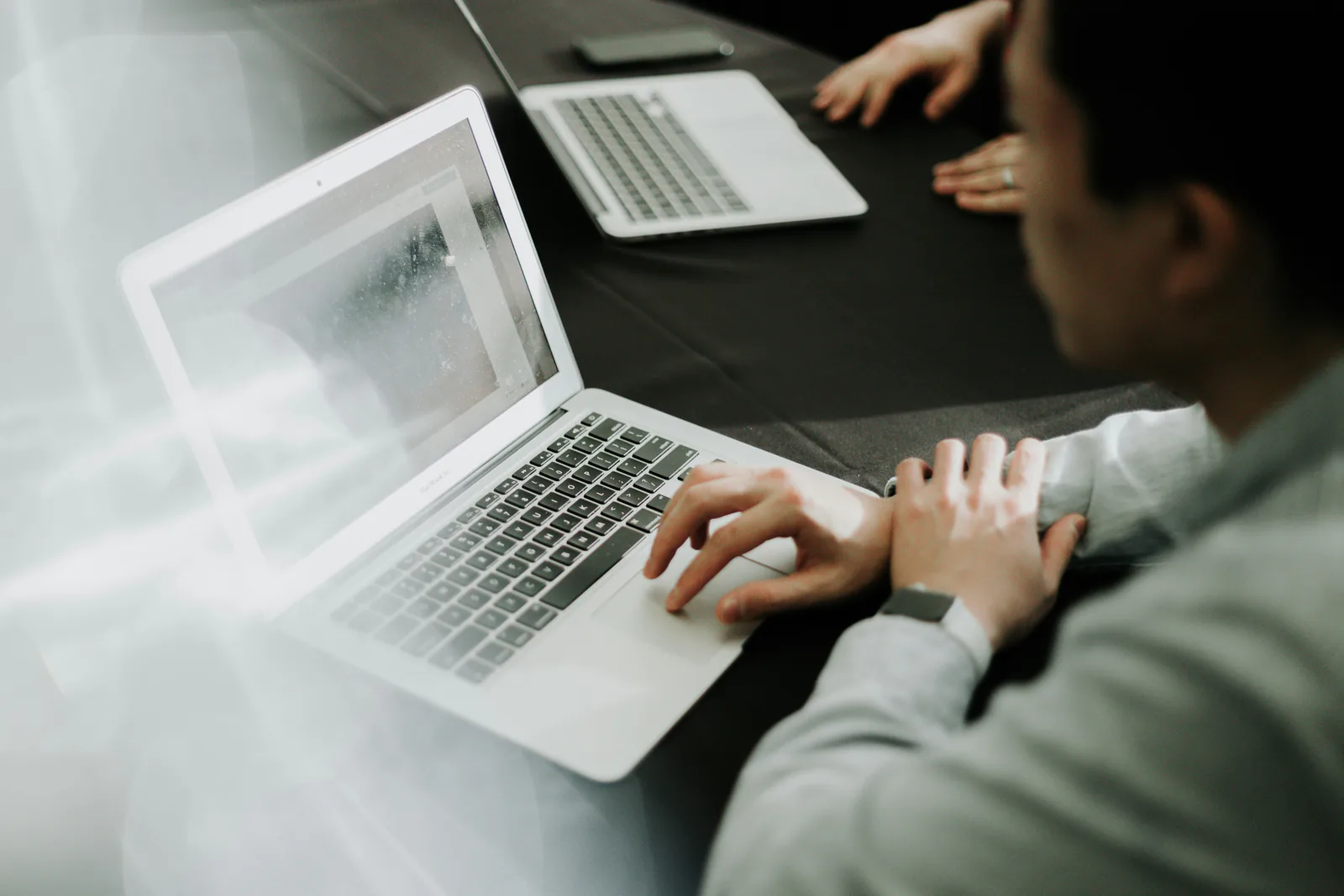 person working on a laptop - DIFC Foundation